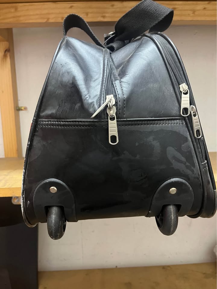 Bolso de mano con ruedas